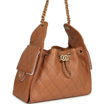 Brown quilted leather hobo bag with gold chain straps and front flap pocket