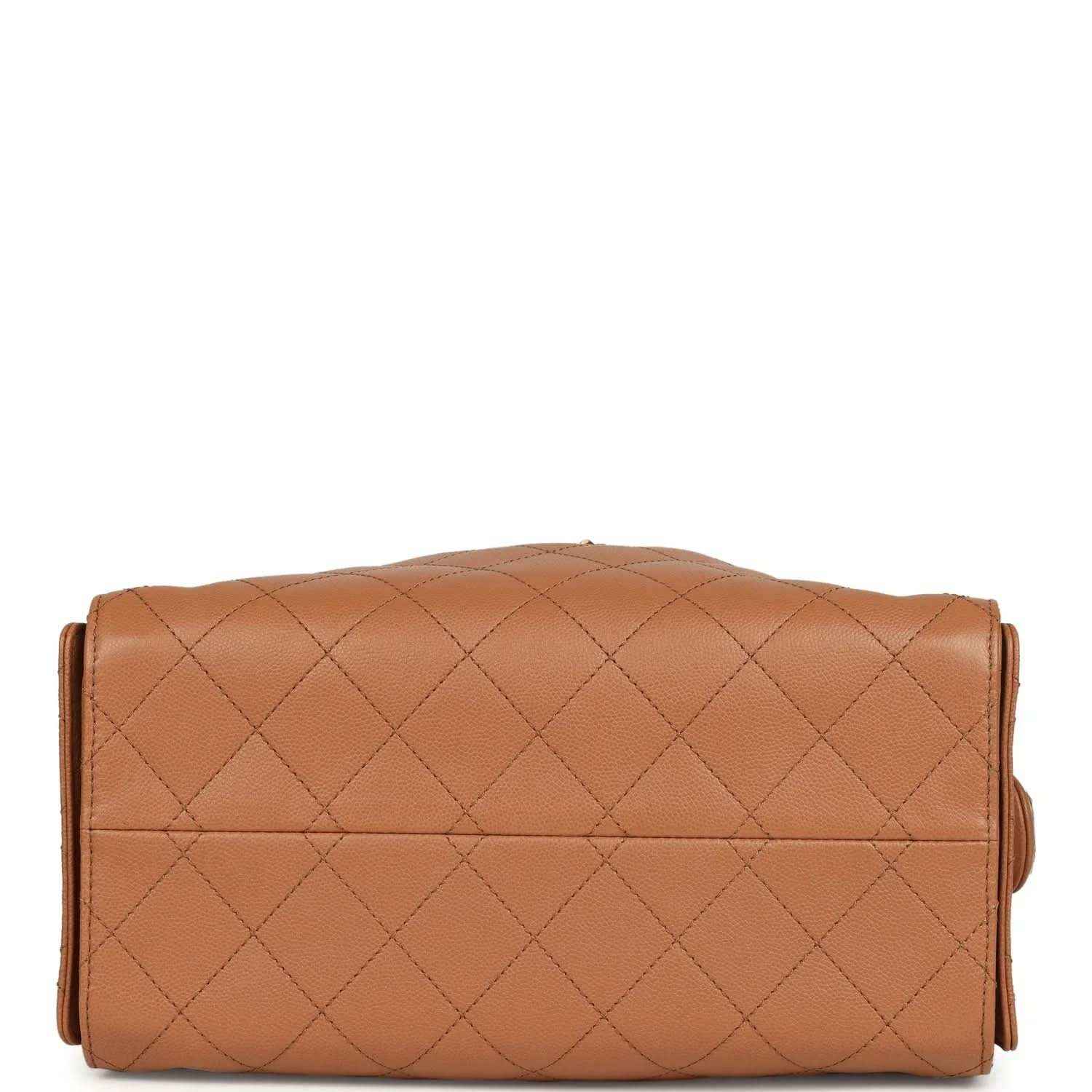 Brown quilted leather shoulder bag with flap closure and gold-toned trim