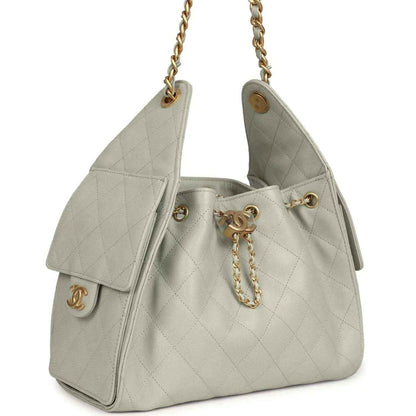 Chanel Small 25 hobo bag in light green quilted leather with front clasp and gold chain