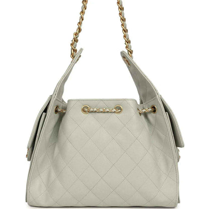 Chanel Small 25 hobo bag in light green quilted caviar leather with chain handles and tassel