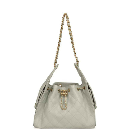 Chanel Small 25 hobo bag in light green quilted leather with gold chain strap and charm
