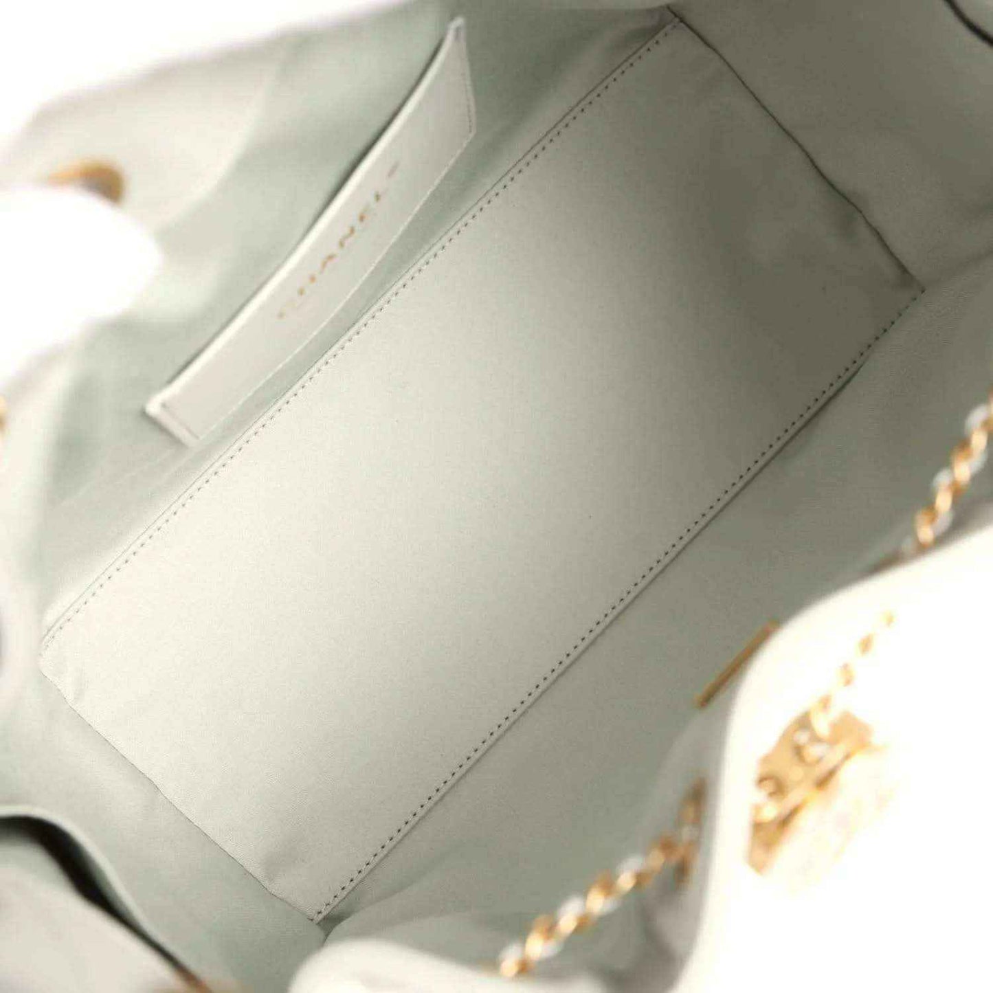Chanel Small 25 hobo bag interior lining in light green fabric with stitched seam
