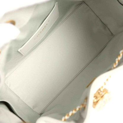 Chanel Small 25 hobo bag interior lining in light green fabric with stitched seam