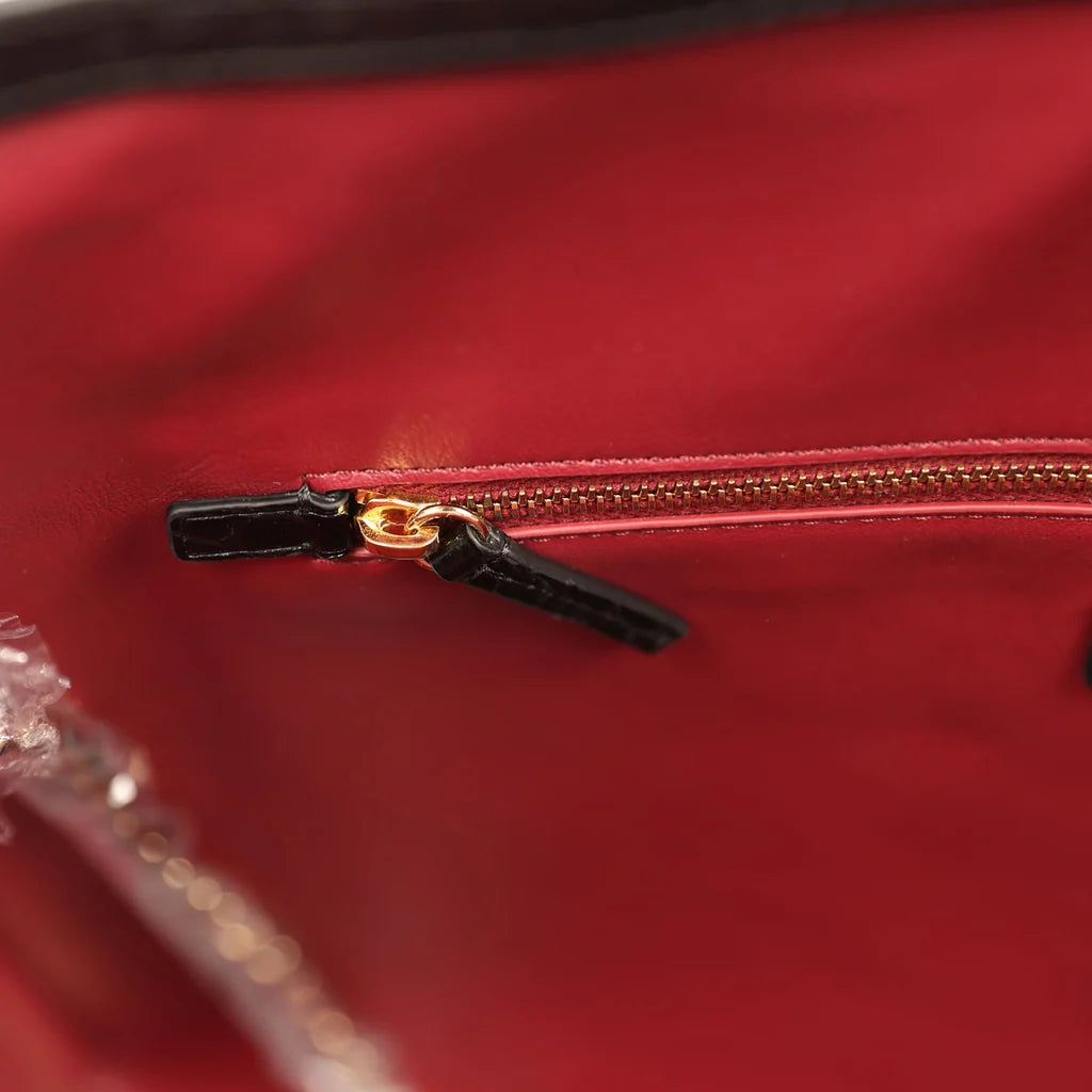 Small Chanel shopping bag gold-tone zipper with leather pull in dark red