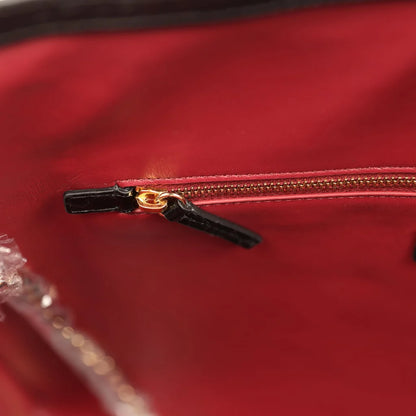 Small Chanel shopping bag gold-tone zipper with leather pull in dark red