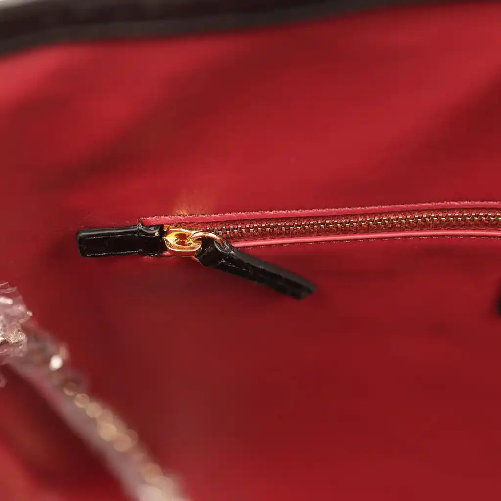Small Chanel shopping bag gold-tone zipper with leather pull in dark red