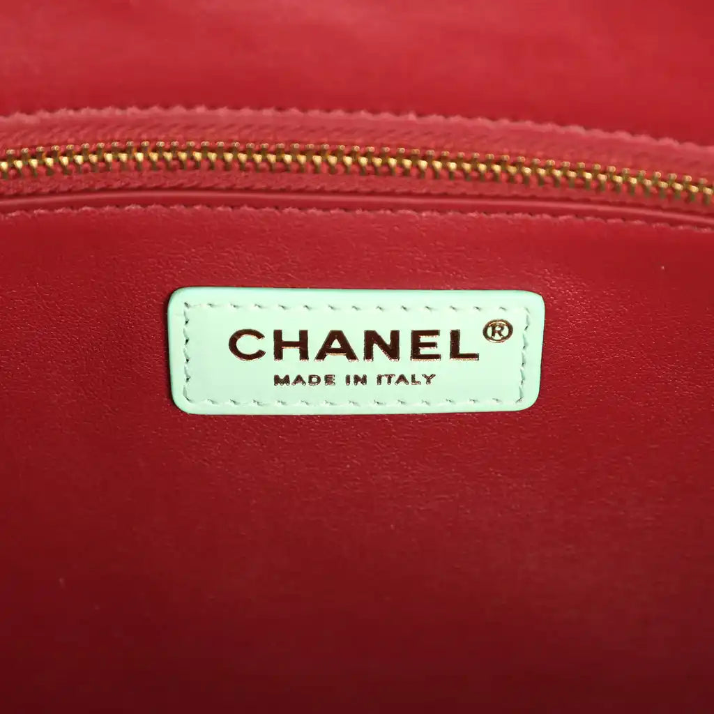 CHANEL® label on burgundy lining with Made in Italy