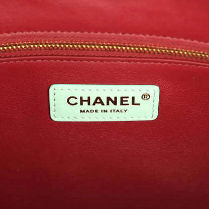 CHANEL® label on burgundy lining with Made in Italy