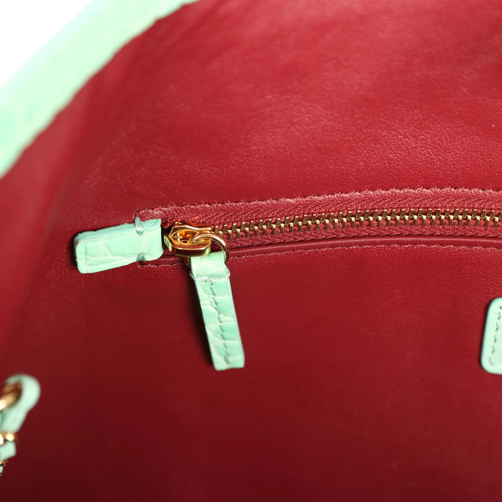 Small Chanel shopping bag with teal croc-embossed calfskin, gold zipper and pull