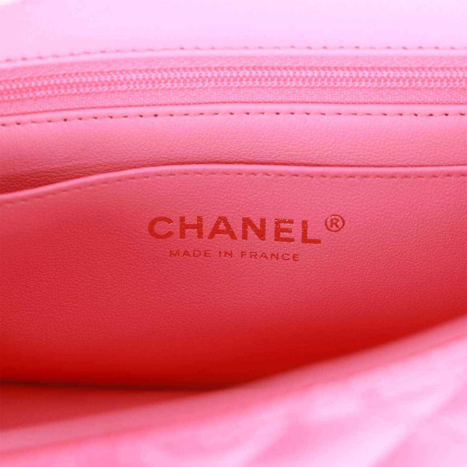 Pink leather interior with CHANEL® and Made in France stamp.