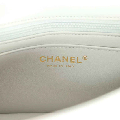 Light grey mini flap bag interior with CHANEL made in Italy label