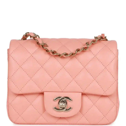 Pink quilted mini flap bag with gold chain strap and Chanel turn-lock clasp