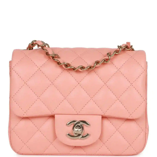 Pink quilted mini flap bag with gold chain strap and Chanel turn-lock clasp