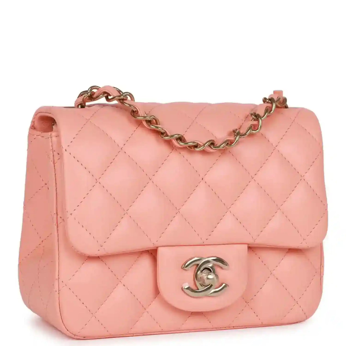 Pink quilted lambskin mini flap bag with gold chain and Chanel turn-lock clasp