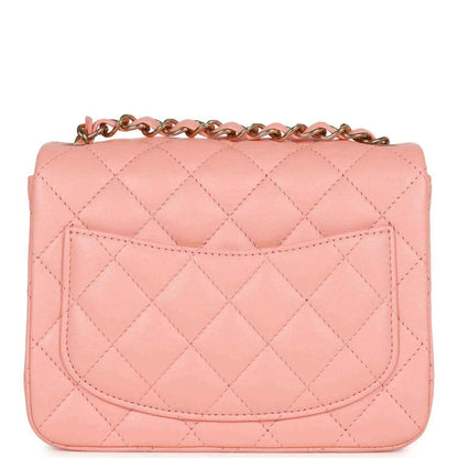 Pink quilted mini flap bag with front flap panel and gold Chanel turn-lock clasp