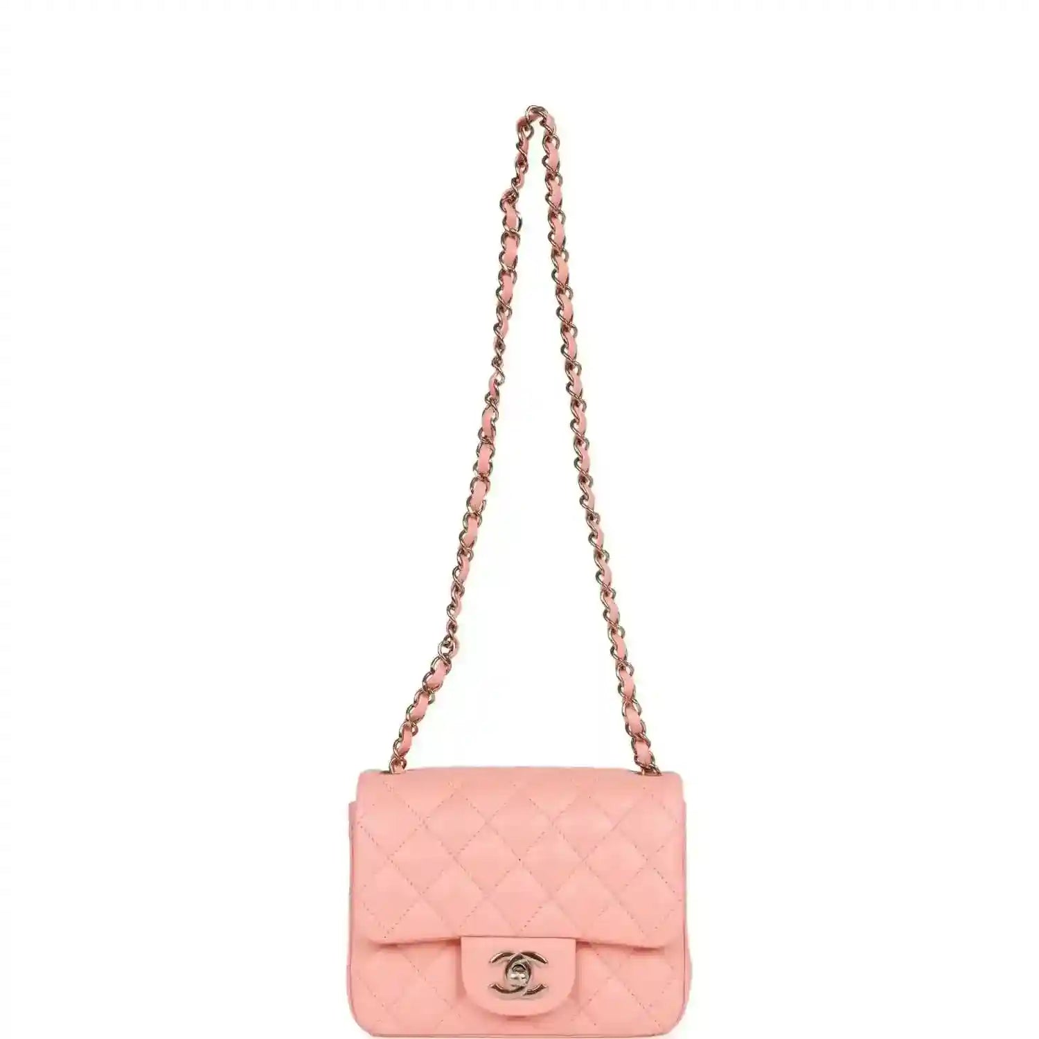 Pink quilted mini flap bag with long gold chain shoulder strap and Chanel clasp