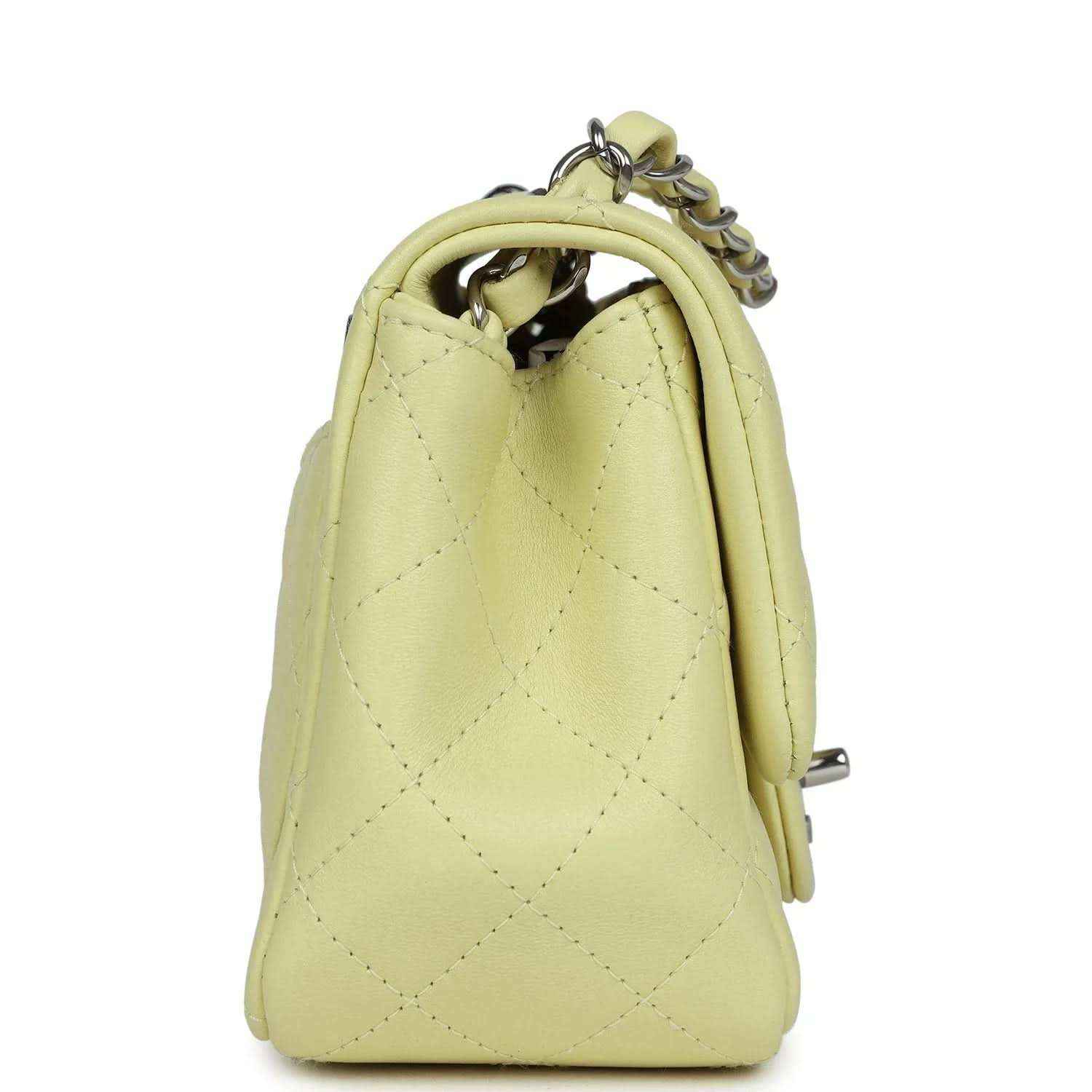 Lime quilted mini square flap bag, side view with leather handle and chain links