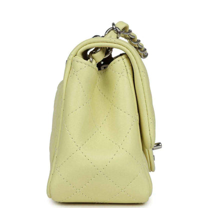 Lime quilted mini square flap bag, side view with leather handle and chain links