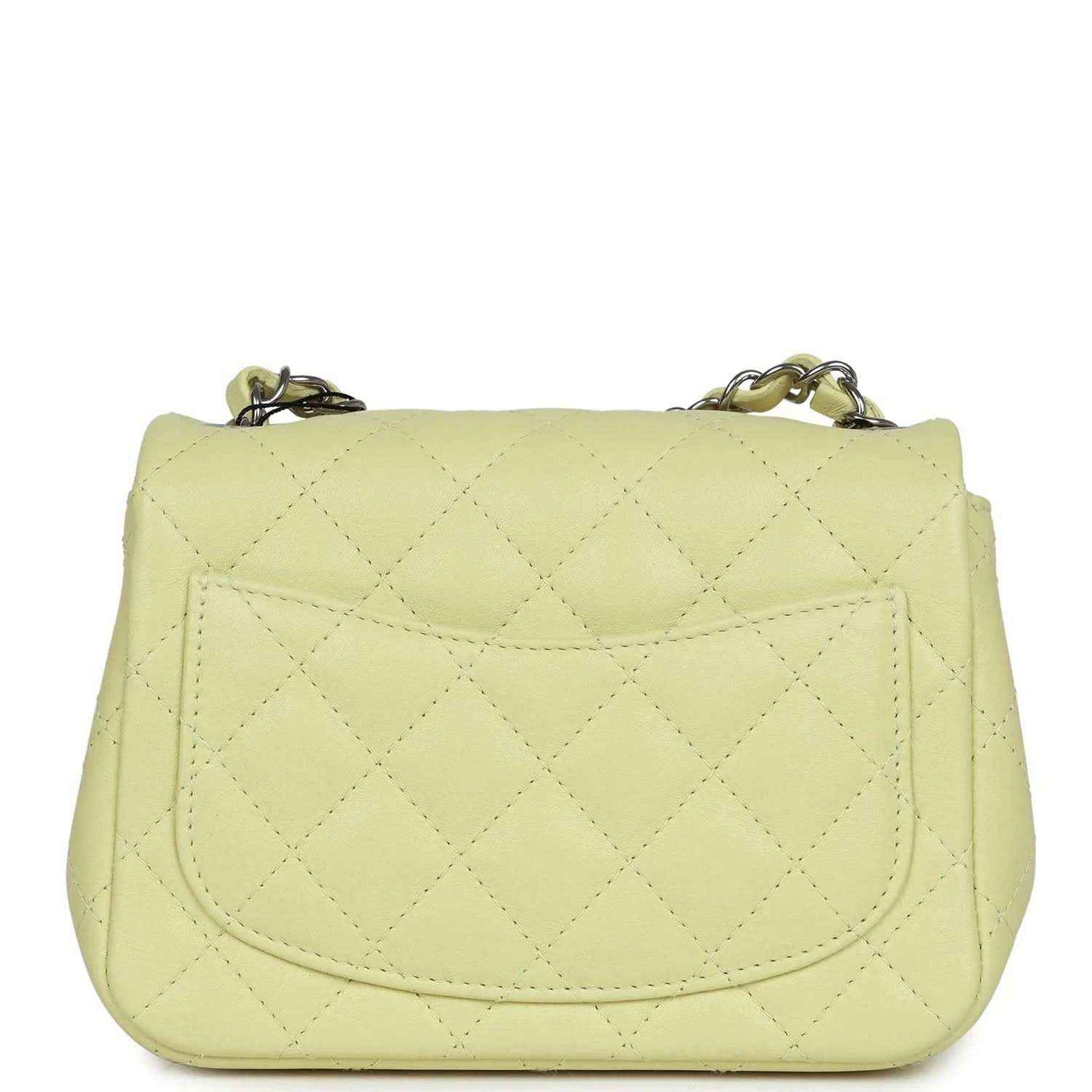 Lime quilted mini square flap bag, back view with stitched flap and curved seams