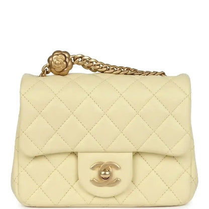 Mini quilted flap bag in pale yellow leather, gold CC turn-lock and chain strap