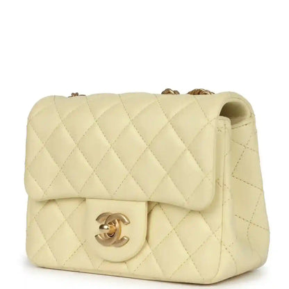 Mini quilted flap bag in pale yellow leather, gold CC turn-lock on front flap