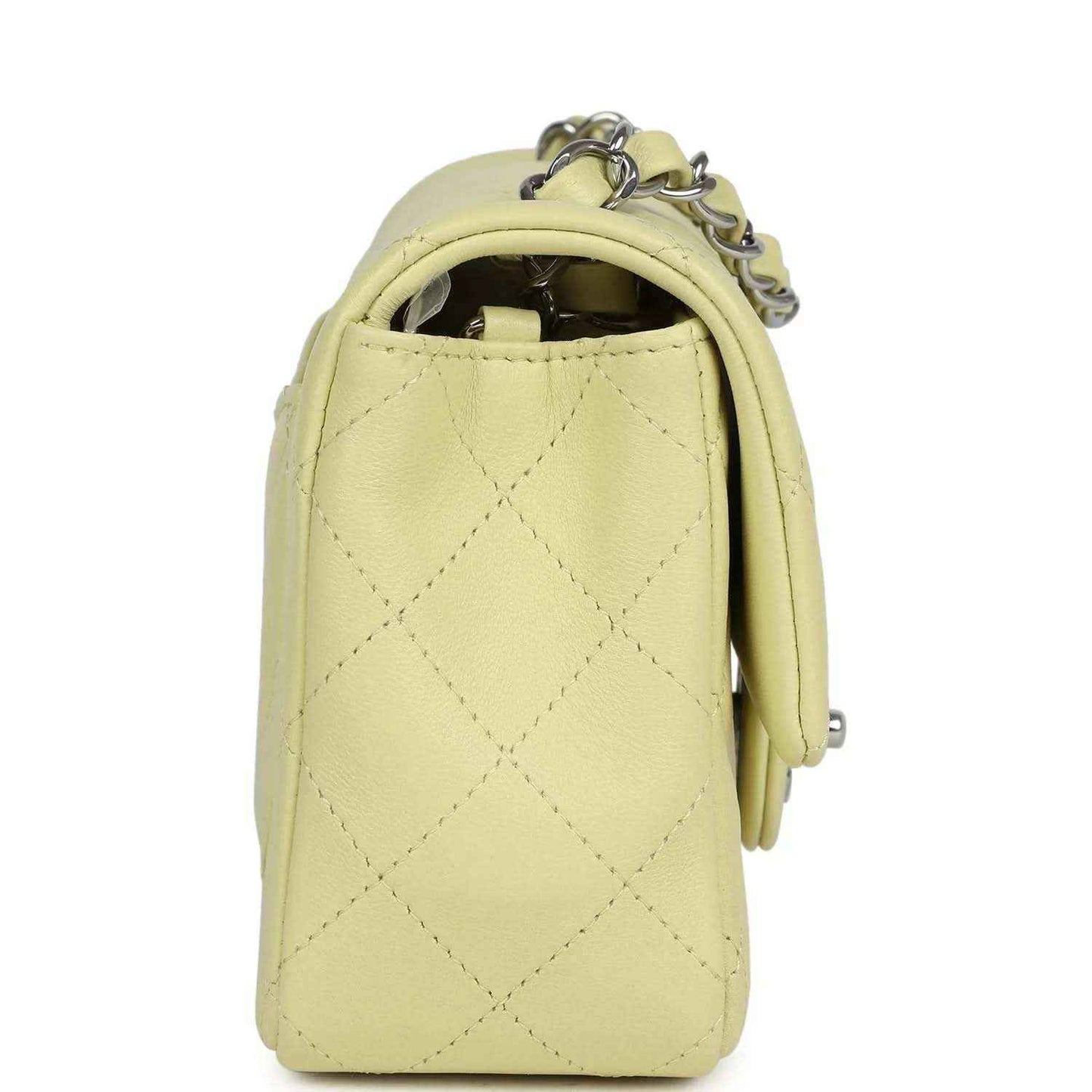 Lime mini flap bag side view with quilted lambskin and silver-tone hardware