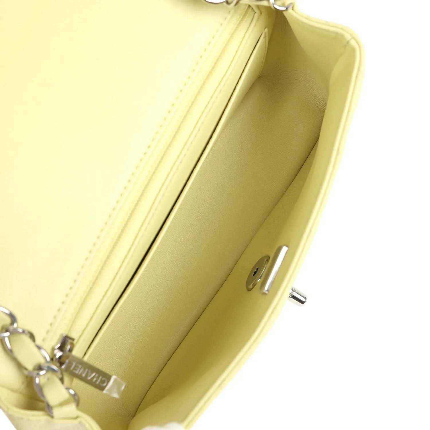 Lime mini flap bag interior opening with smooth lining and silver-tone turn-lock