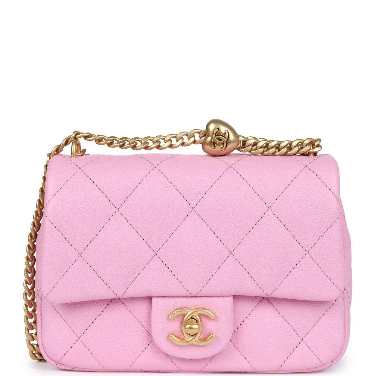 Pink quilted caviar leather mini flap bag with gold-tone chain strap and CC clasp