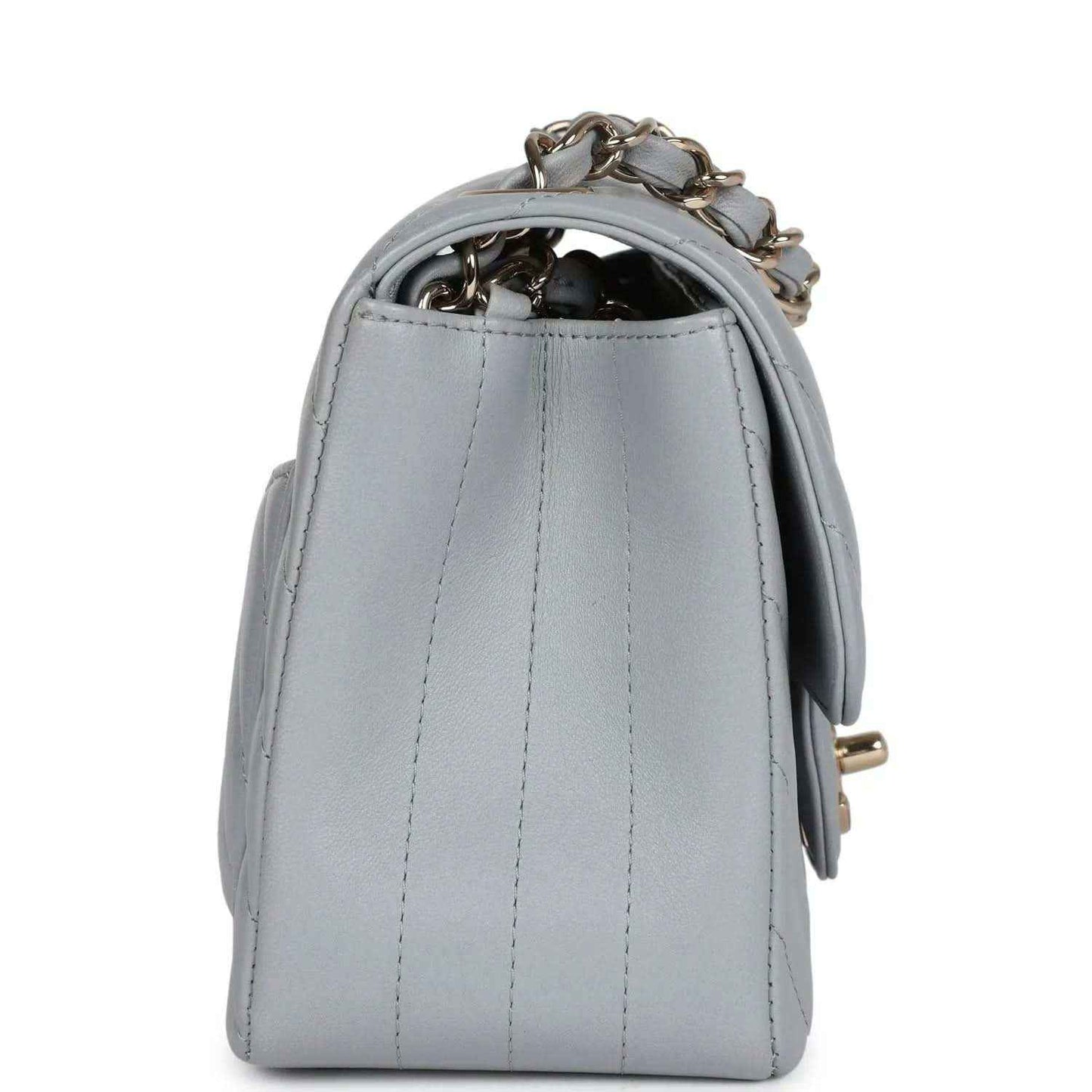 Light grey mini shoulder bag back panel with vertical stitching and chain strap loop