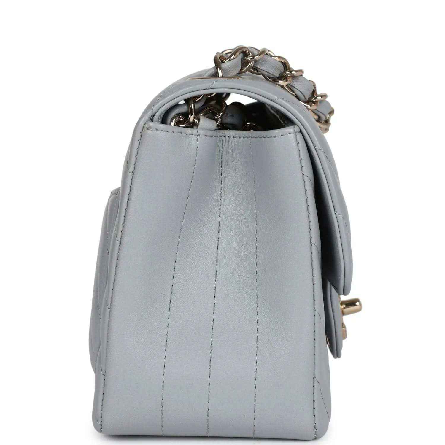 Light grey mini shoulder bag back panel with vertical stitching and chain strap loop