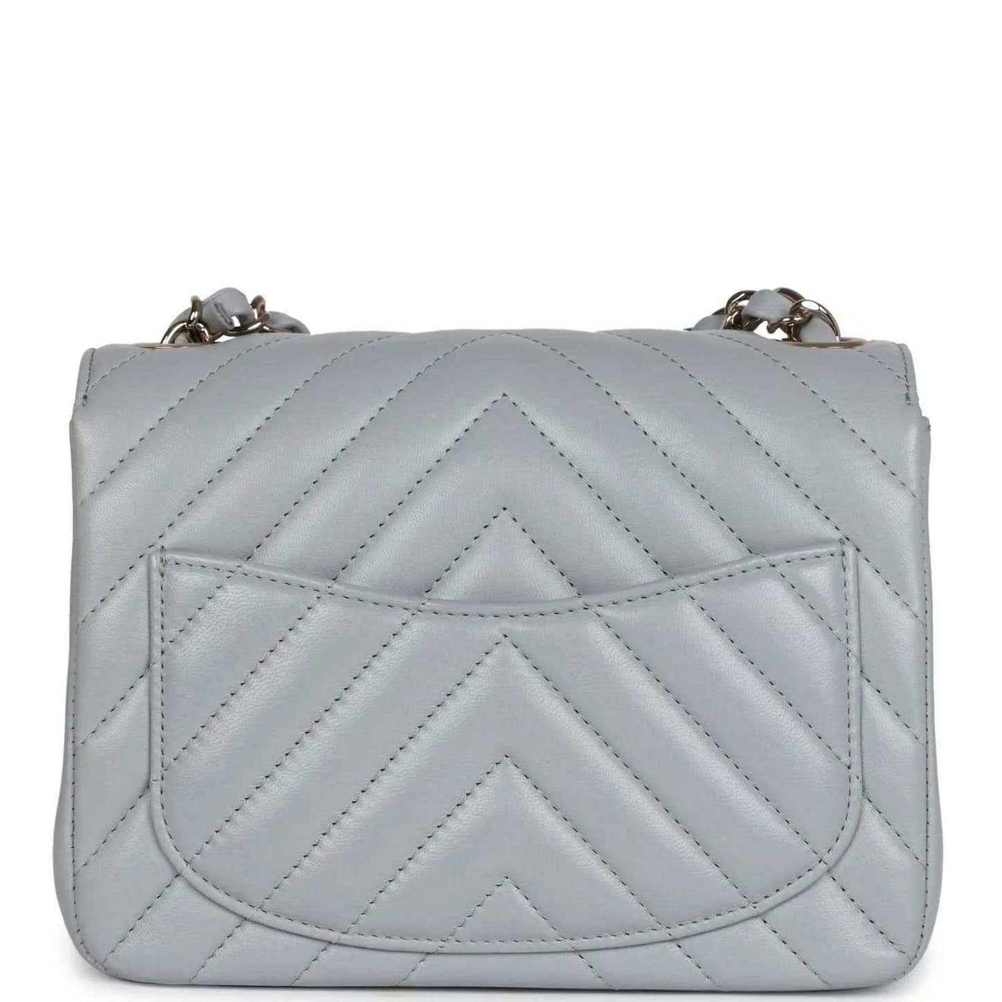 Light grey mini quilted bag with raised chevron quilting on the front