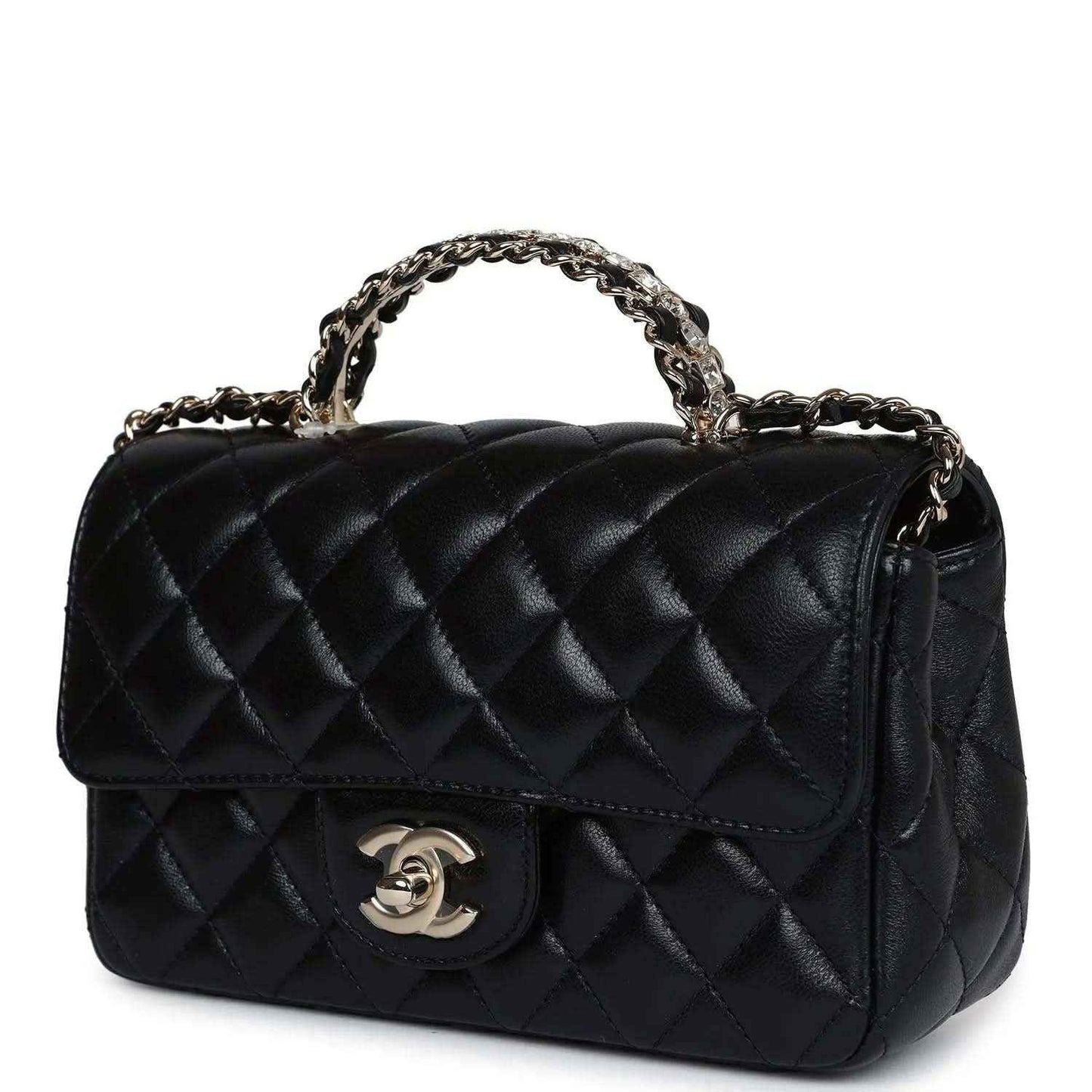Mini flap bag in black quilted leather with top chain handle and CC logo on front