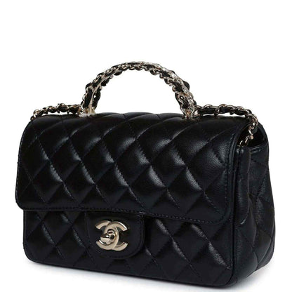 Mini flap bag in black quilted leather with top chain handle and CC logo on front