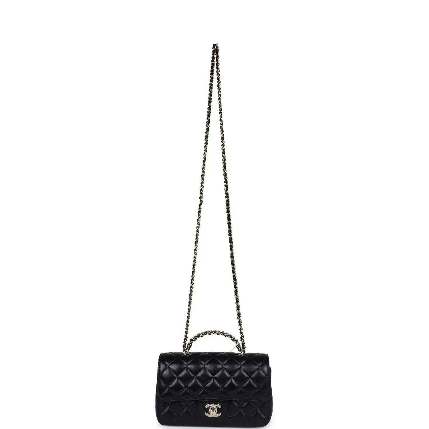 Mini black quilted flap bag with long chain strap and CC logo on front