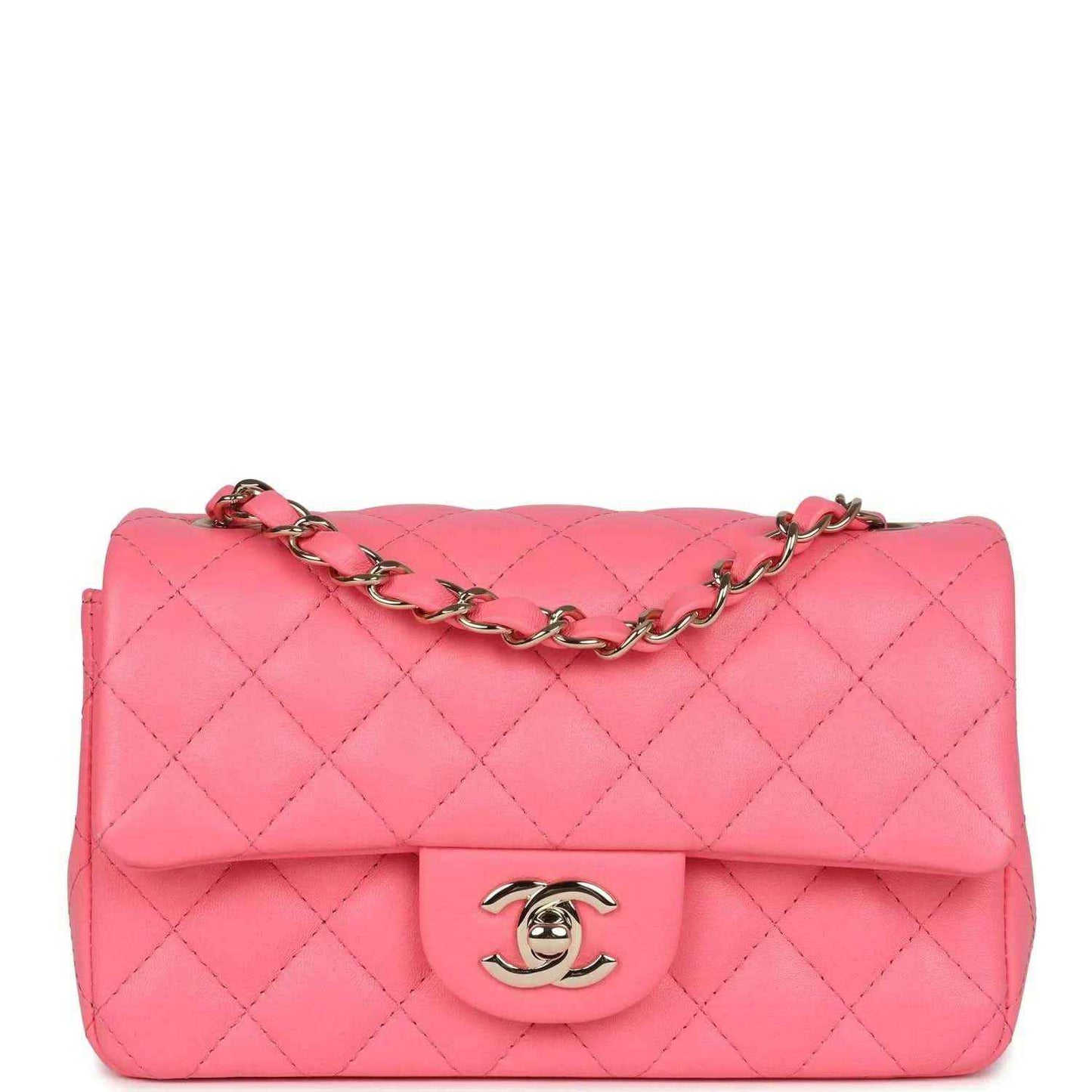 Hot pink quilted mini flap bag with gold-tone chain strap and logo clasp