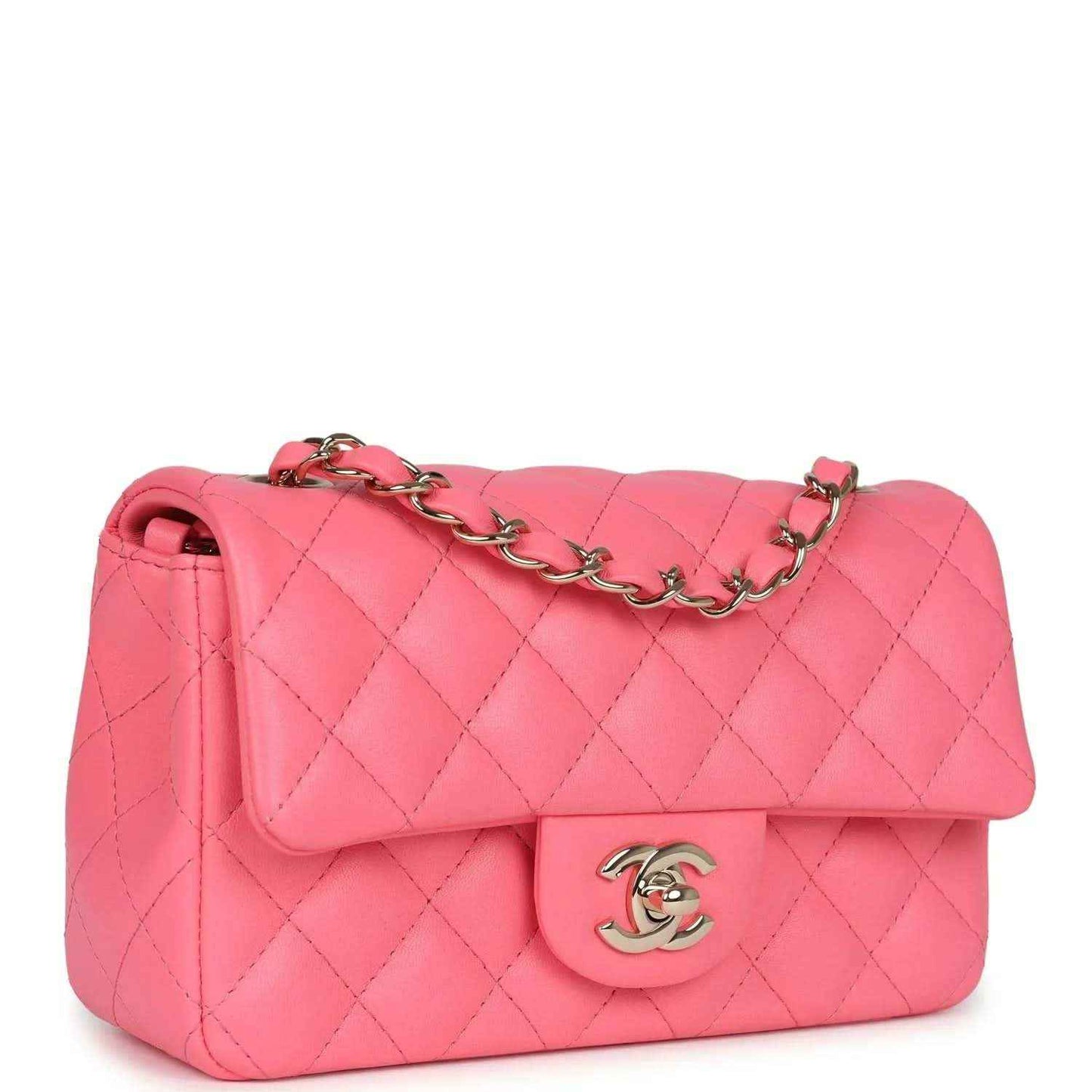 Hot pink quilted mini flap bag with gold-tone chain strap and front logo plate