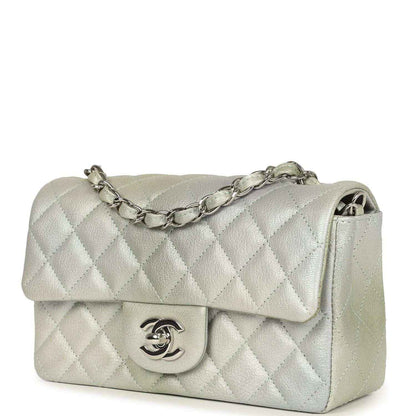 Mini rectangular flap bag with quilted leather, chain strap, and CC logo on front