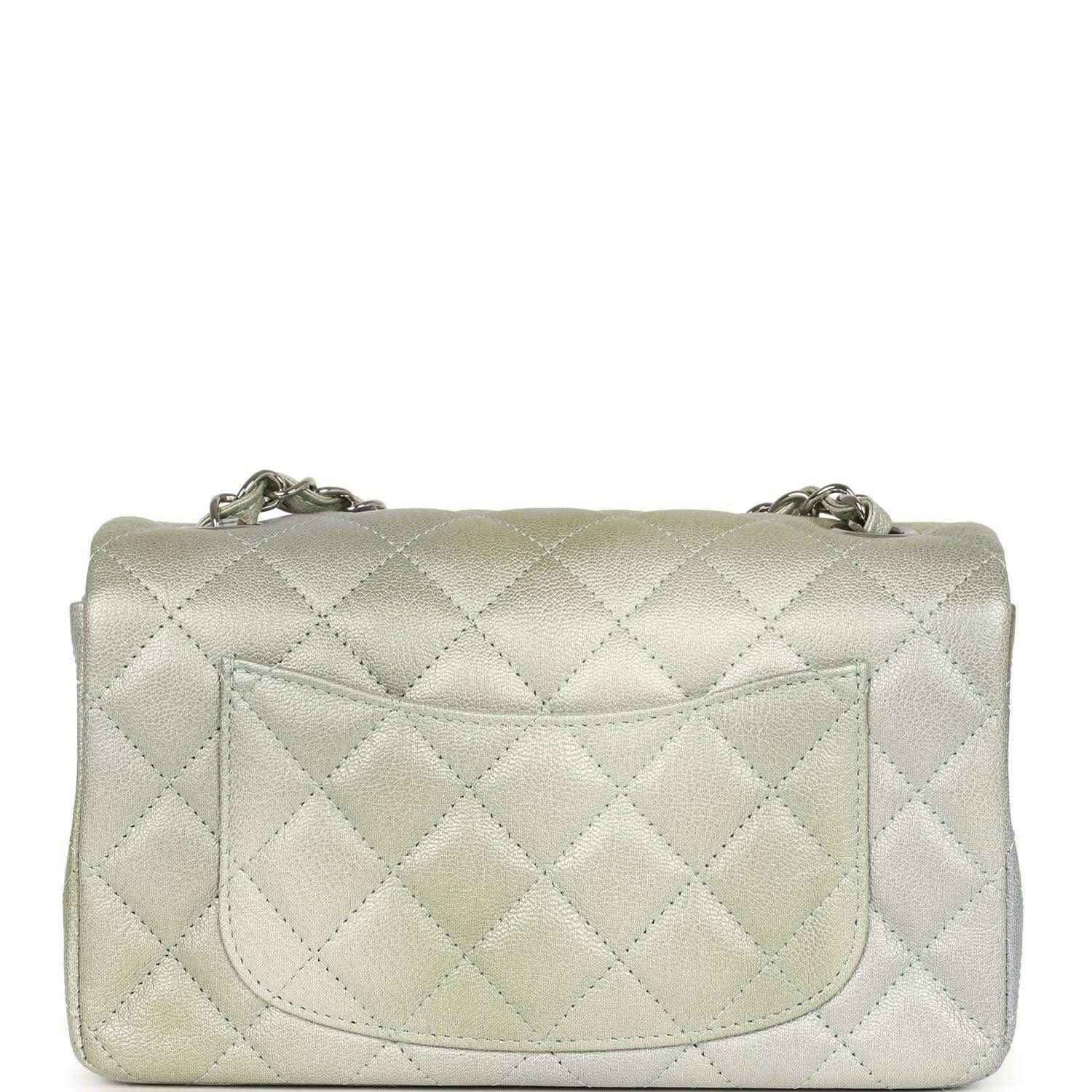Mini rectangular flap bag with quilted front panel, hinged flap, and CC logo