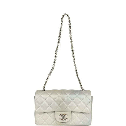 Mini rectangular flap bag with chain strap and quilted front featuring CC logo