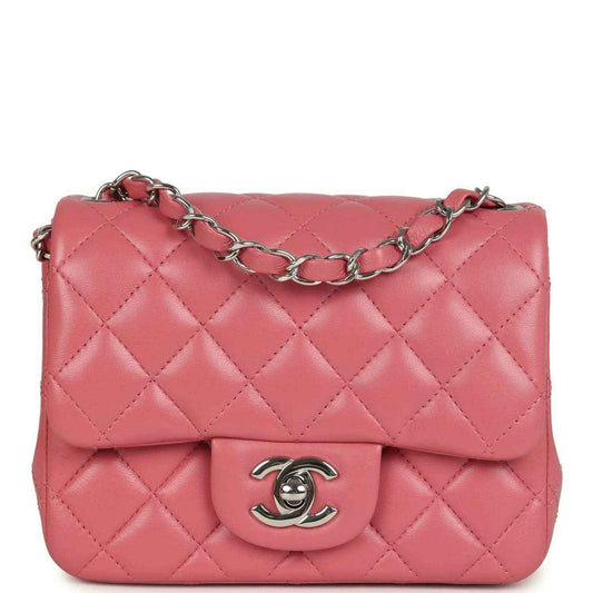 Pink quilted lambskin mini flap bag with silver chain strap and CC logo clasp