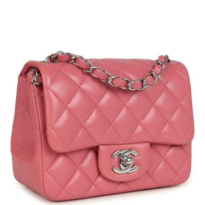 Pink quilted mini flap bag with silver chain strap and CC logo on front flap