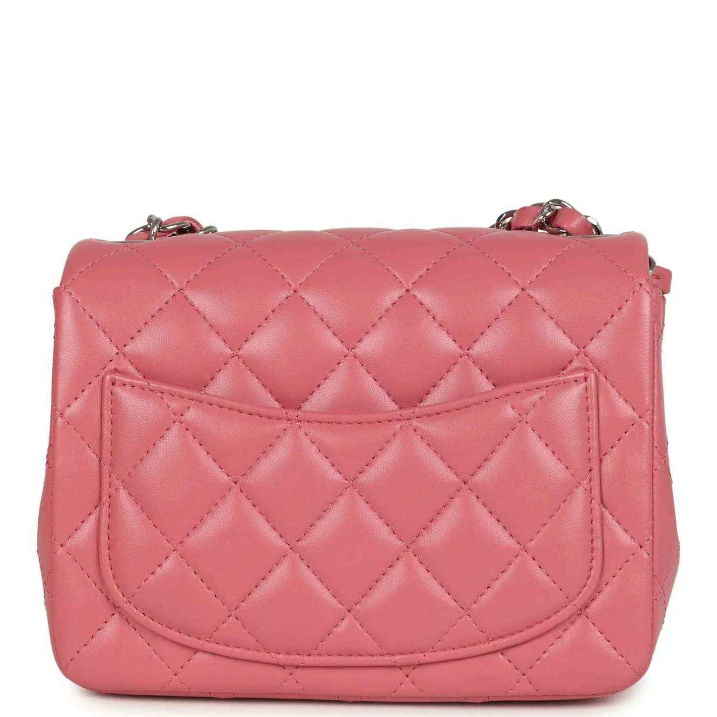 Pink quilted lambskin mini flap bag back with stitched flap pocket and CC logo