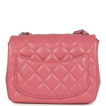 Pink quilted lambskin mini flap bag back with stitched flap pocket and CC logo