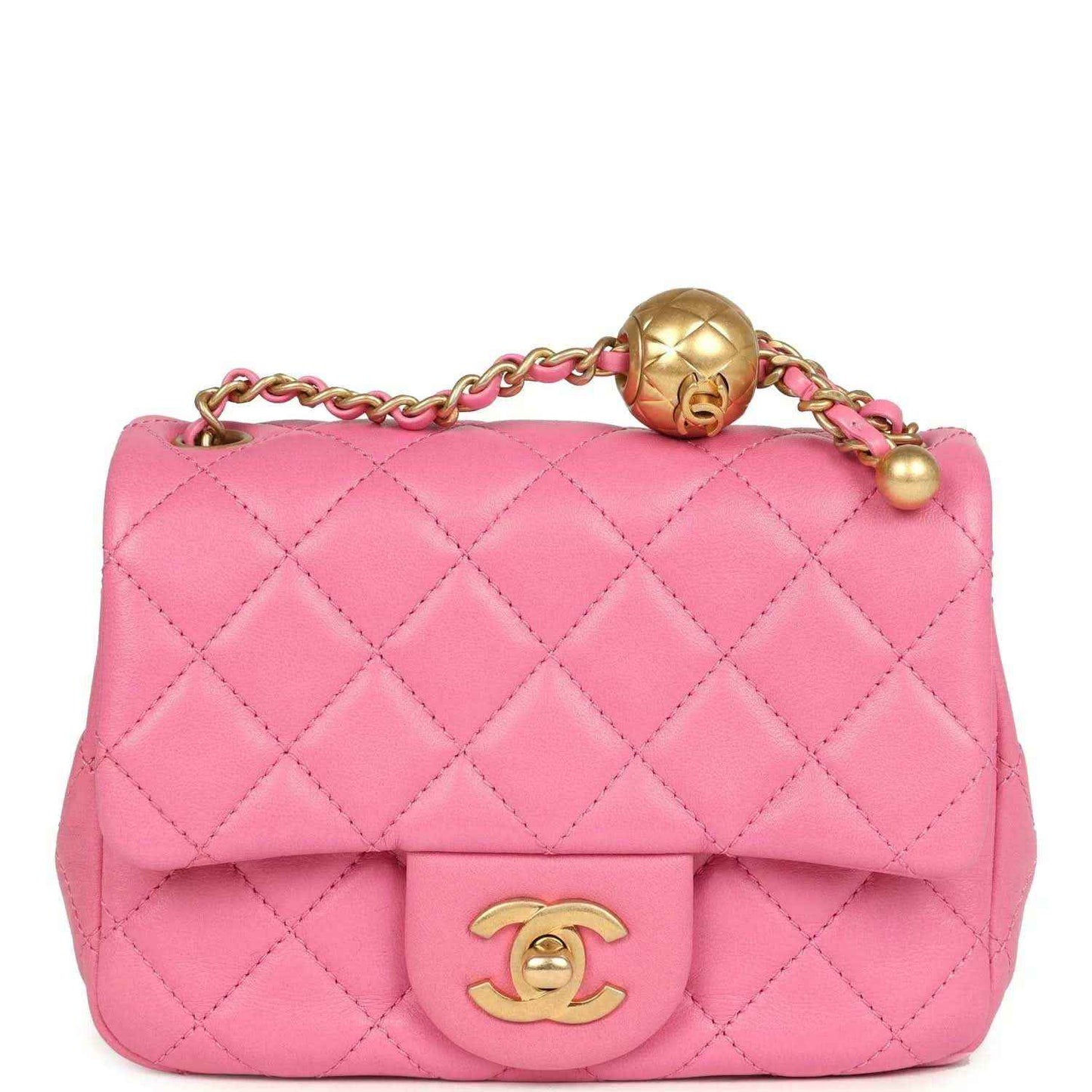 Pink quilted mini square flap bag with gold-tone turn-lock and chain strap.