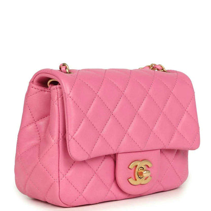 Pink quilted mini flap shoulder bag with gold-tone CC logo and chain strap.