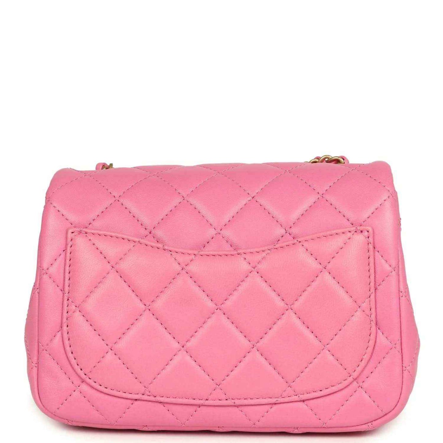 Pink quilted mini square flap bag with gold-tone CC emblem on front flap.