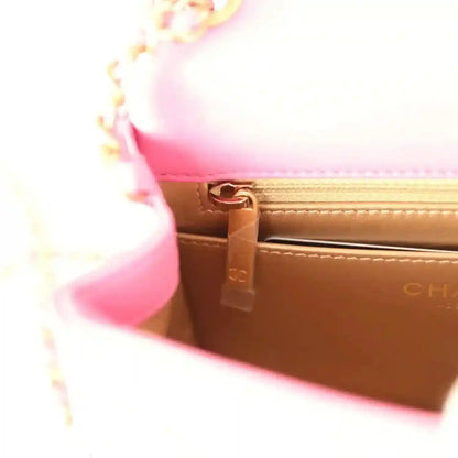 Chanel mini square flap bag in pink lambskin with gold hardware clasp