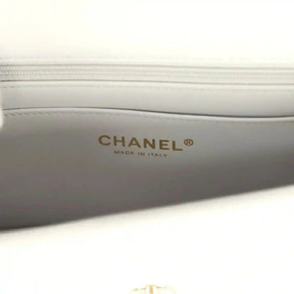 Chanel mini flap bag interior stamp reading CHANEL and MADE IN ITALY
