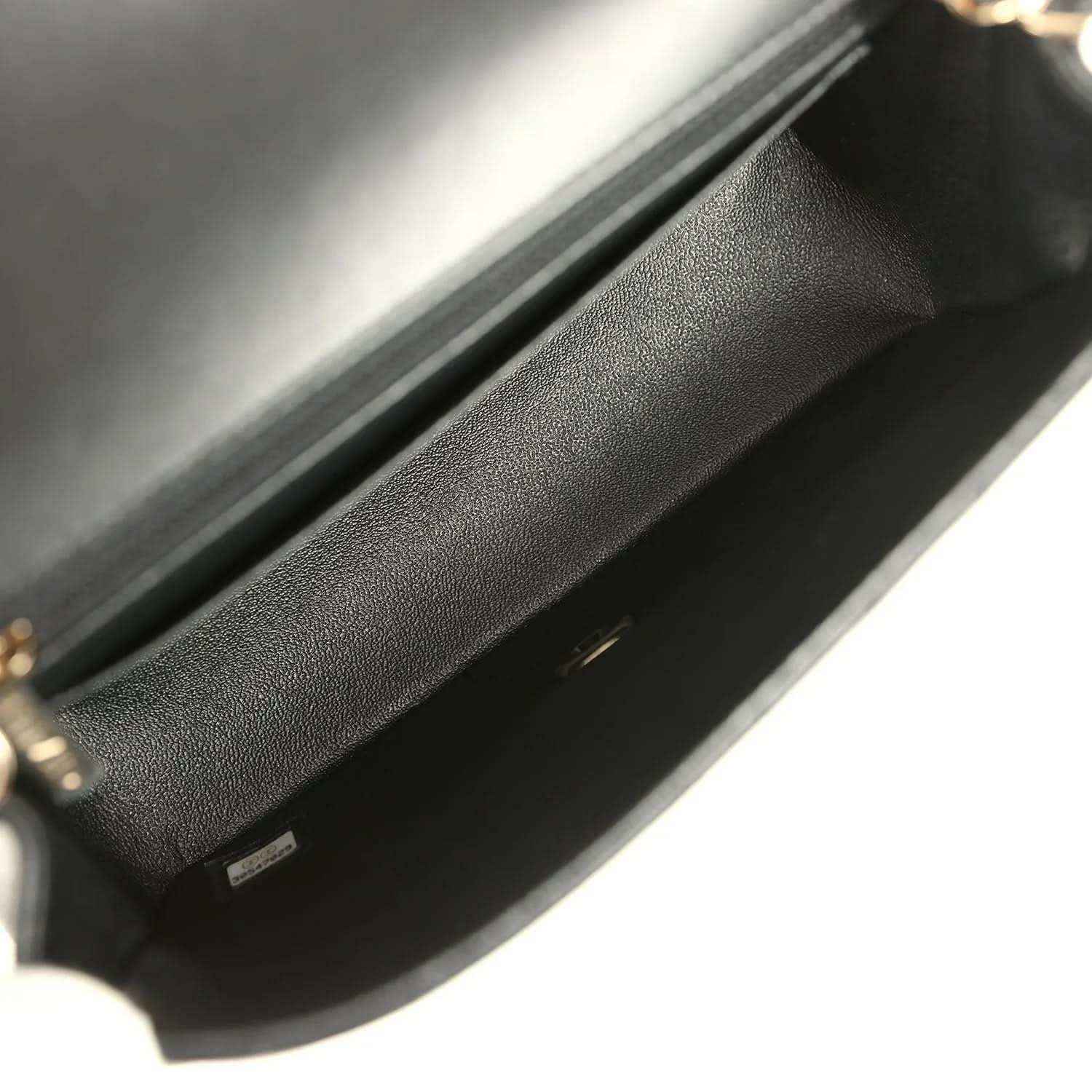 Chanel mini flap bag interior, black leather lining and top edge stitching