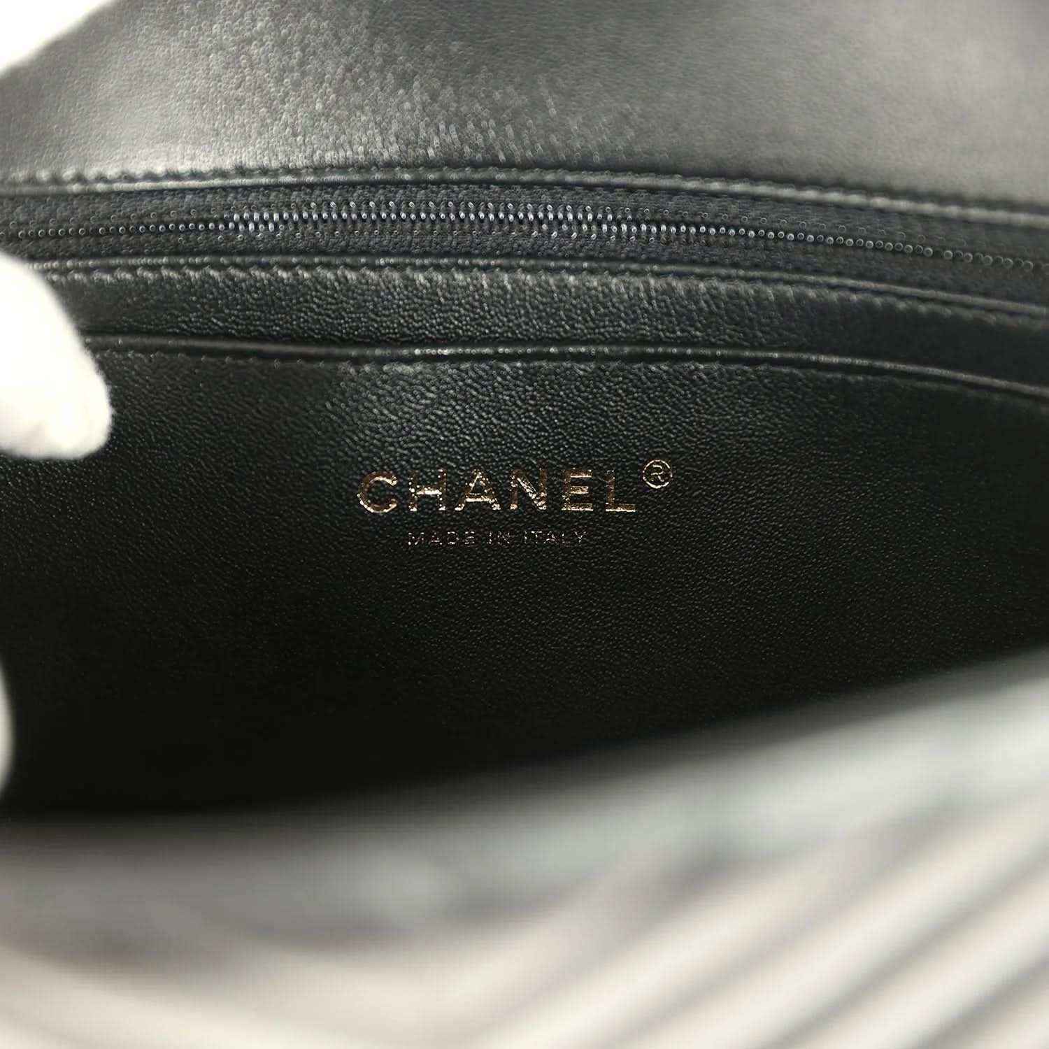 Chanel mini bag interior panel with CHANEL logo patch
